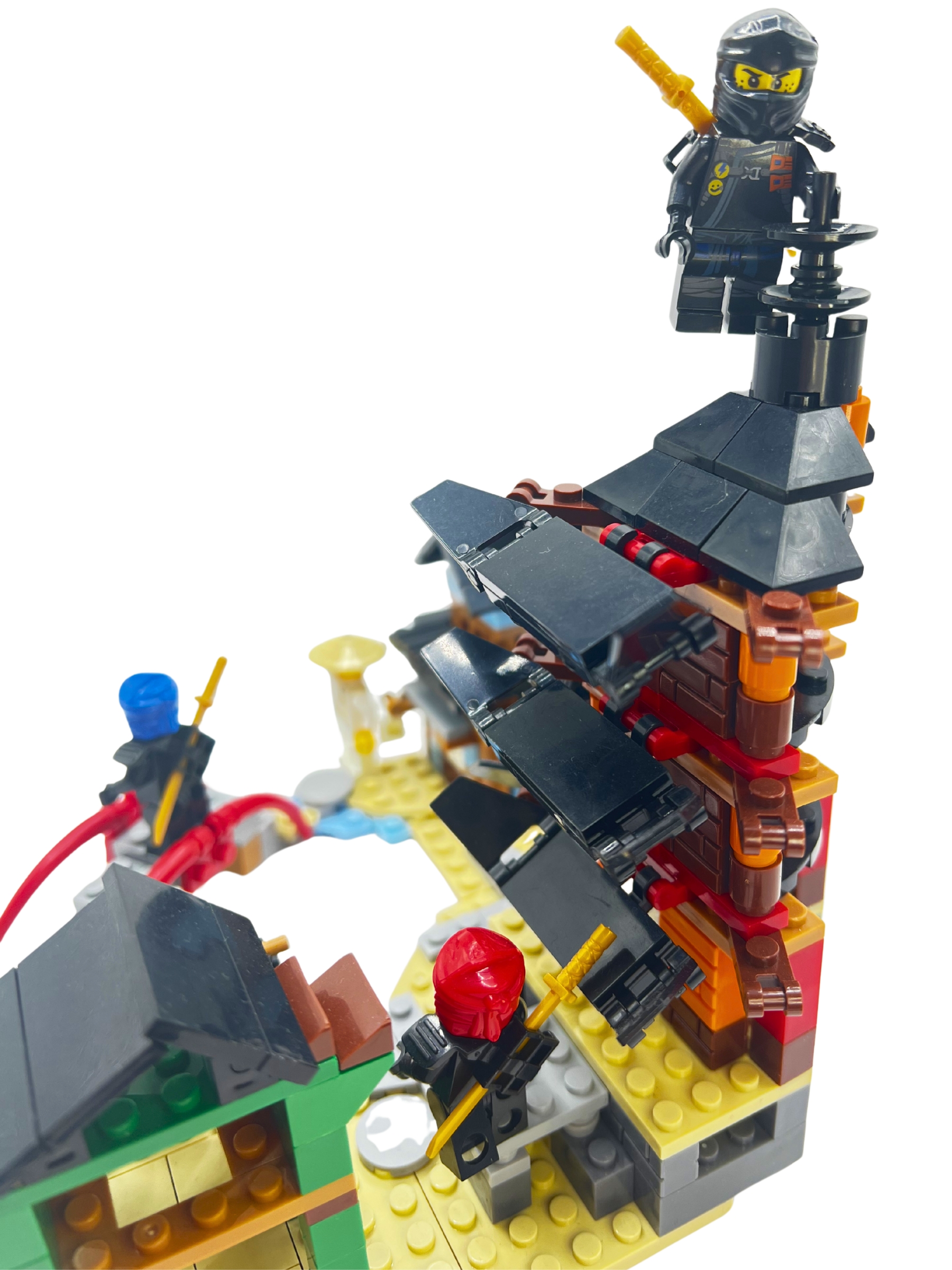 Ninja Fortress set - dramatic side angle of pagoda tower with black ninja on top