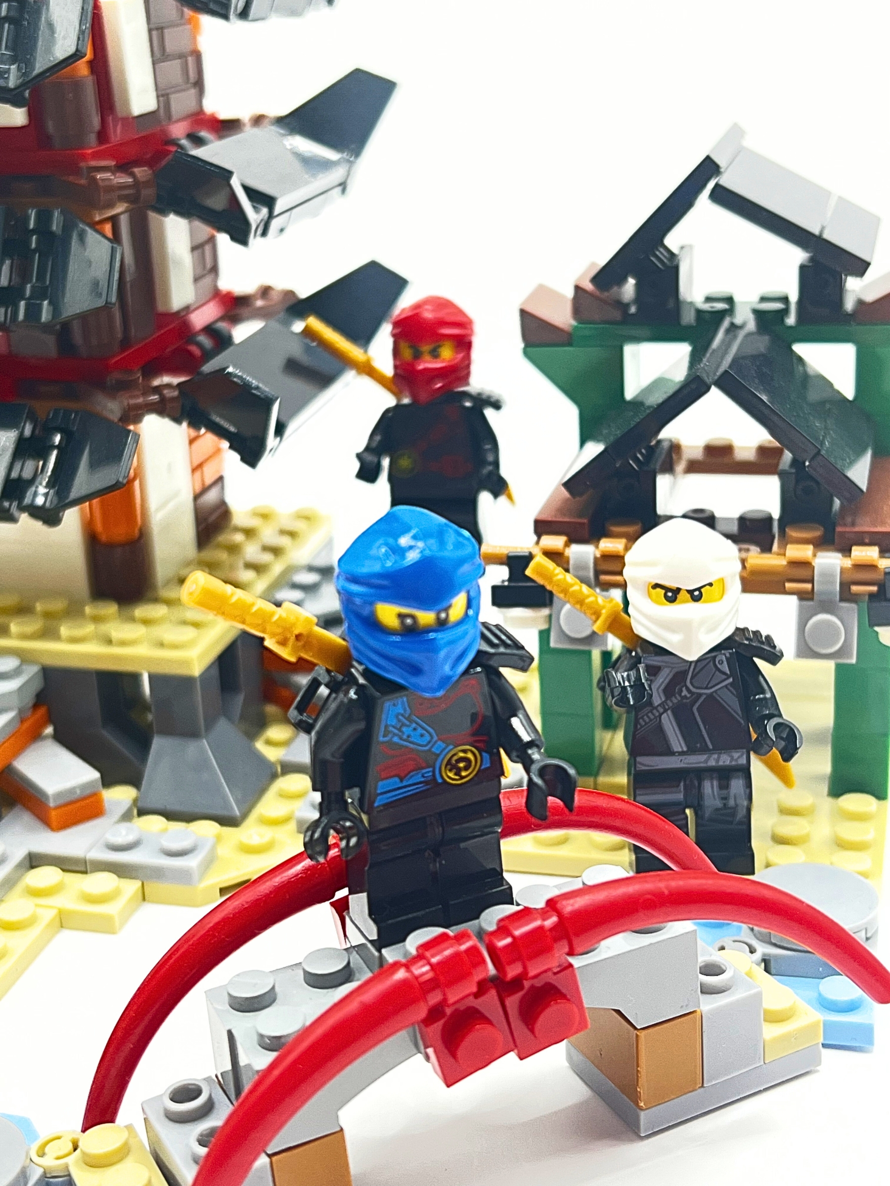 Ninja Fortress set - blue white and red ninja character figures by the red bridge